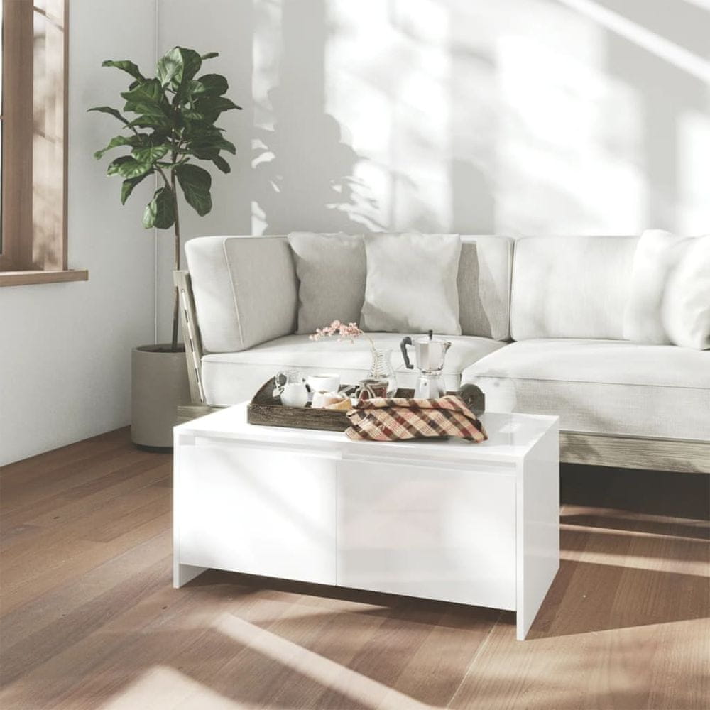 Vidaxl Konferenčný stolík lesklý biely 90x50x41,5 cm drevotrieska